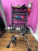 Dumbbells, resistance bands and a pedal exerciser